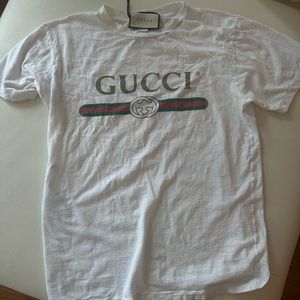 Rare Gucci T shirt with flower sitch on back.